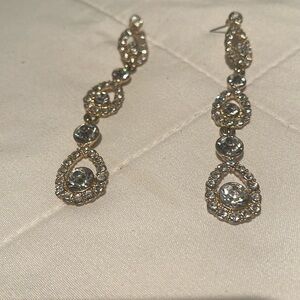 Gold 3 inch tear drop earrings.  Perfect with purple sequin gown I have listed!